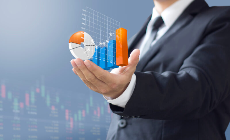 Businessman holding Statistic